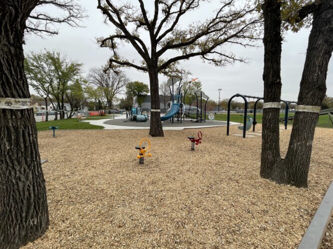 Corydon Community Centre Playground with trees around