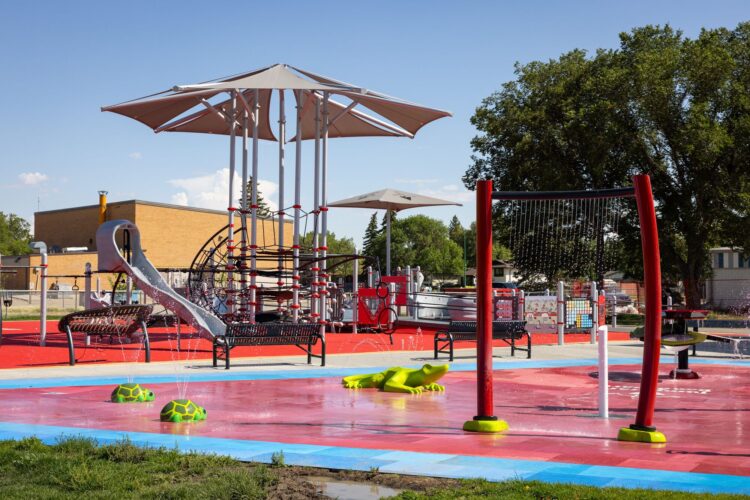 Splash pad with red surfacing.