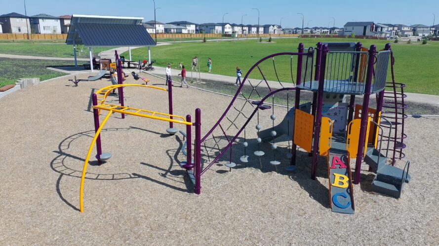 Side view of the play equipment and shelter at Firestone Park